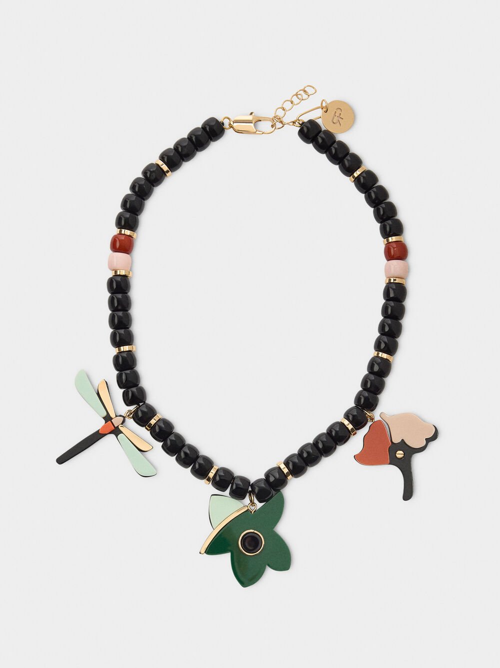 Collier de perles avec pendentifs en résine