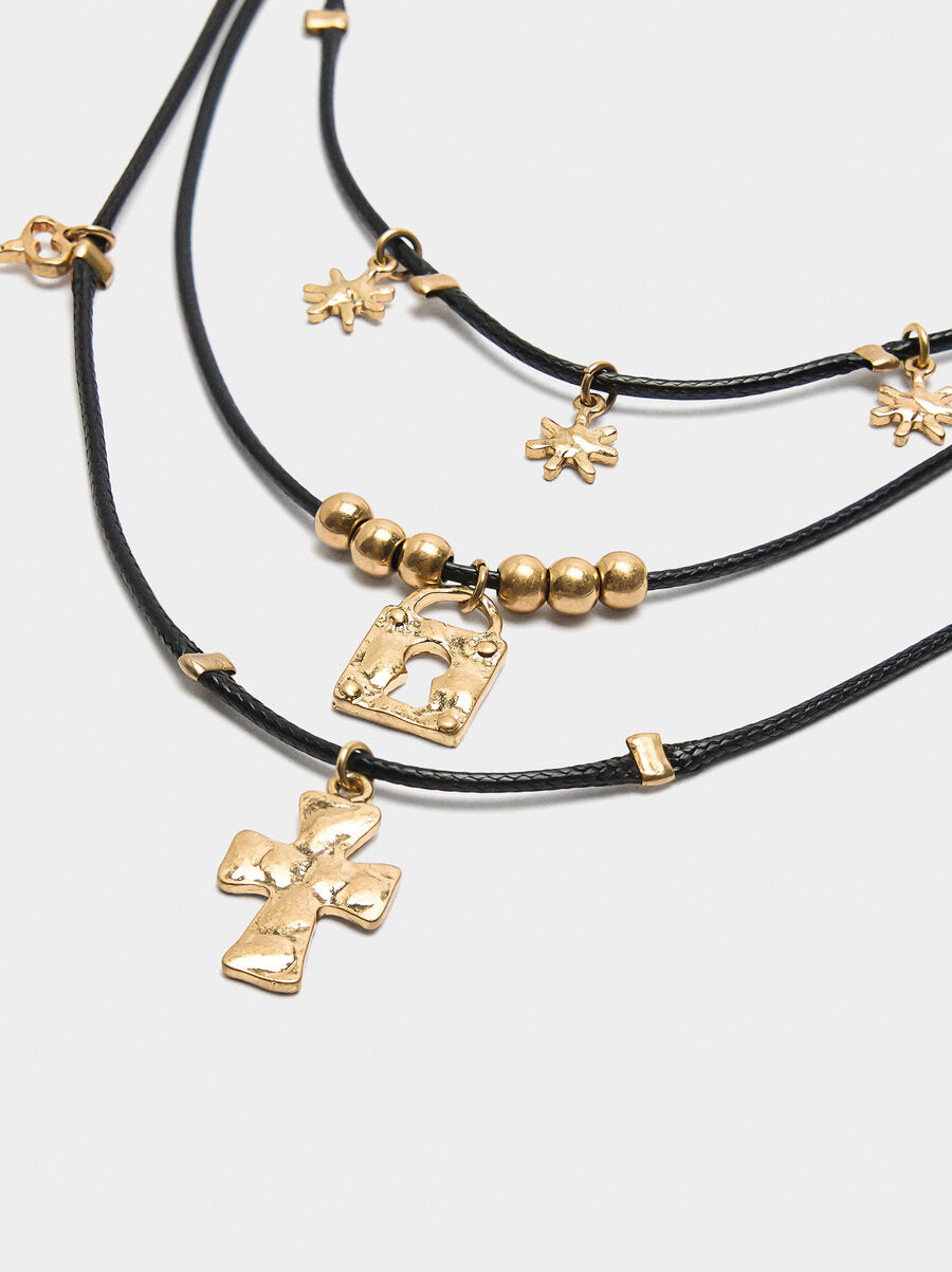 Triple necklace with pendants and charms