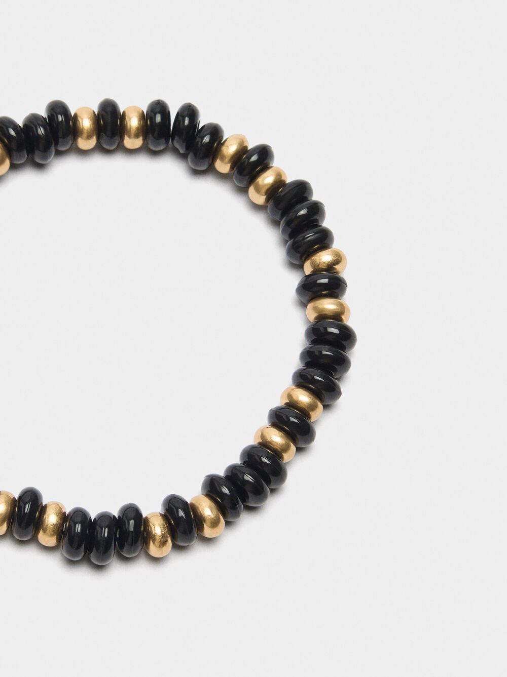 Elastic bracelet with bicolor beads