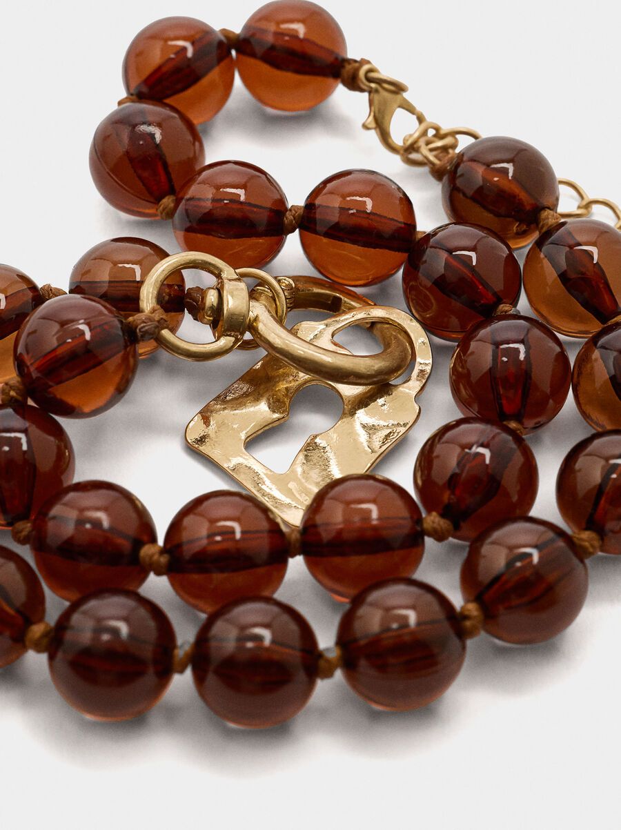 Short necklace with beads stone effect