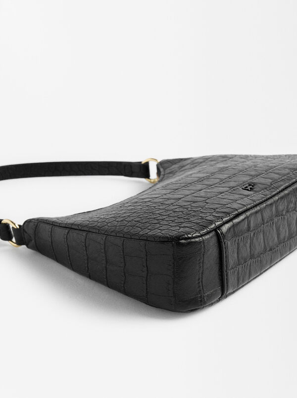 Borsa a spalla con incisione animale