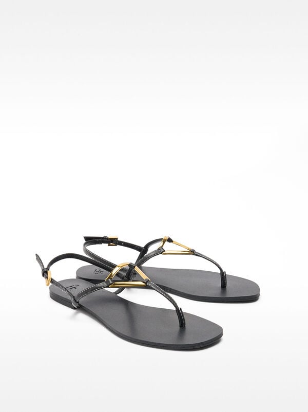 Flat sandals with metallic detail straps