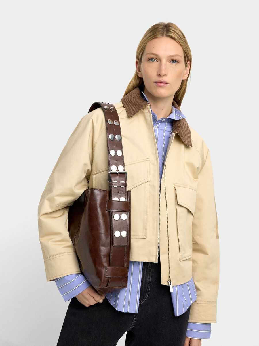 Leather shoulder bag with studs