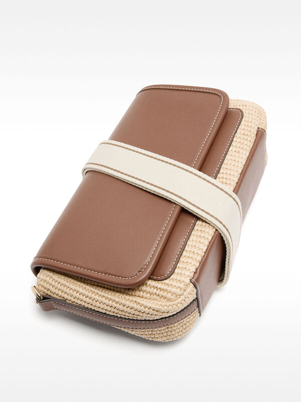 Crossbody bag with straw effect and flap
