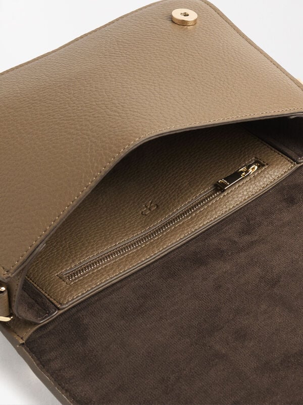 Shoulder bag with fur and flap closure
