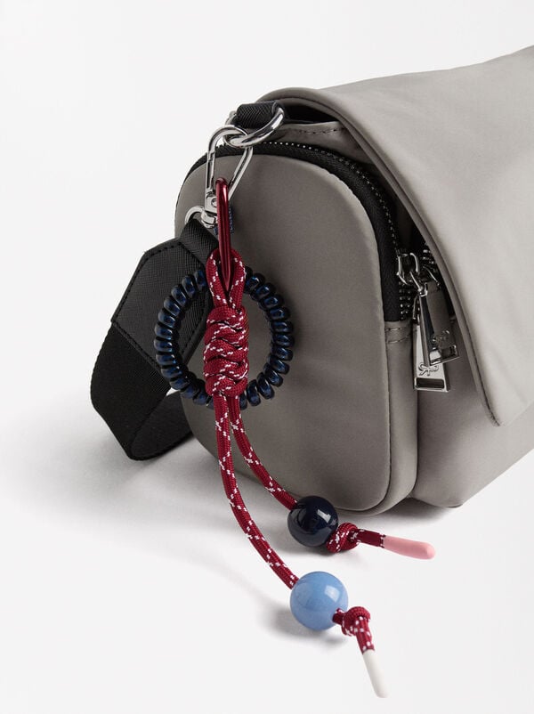 Crossbag with flap closure