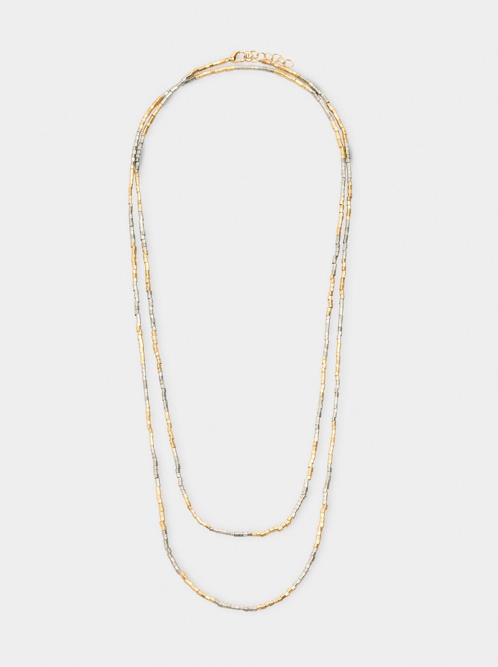 Bicolor necklace with two turns