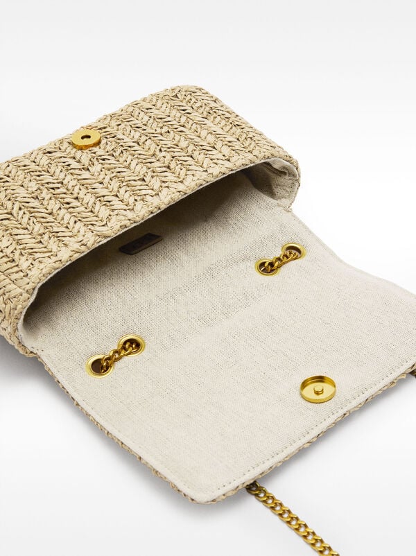 Shoulder bag with straw effect