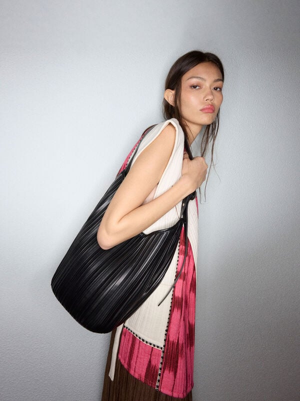 Pleated shoulder bag with removable pouch