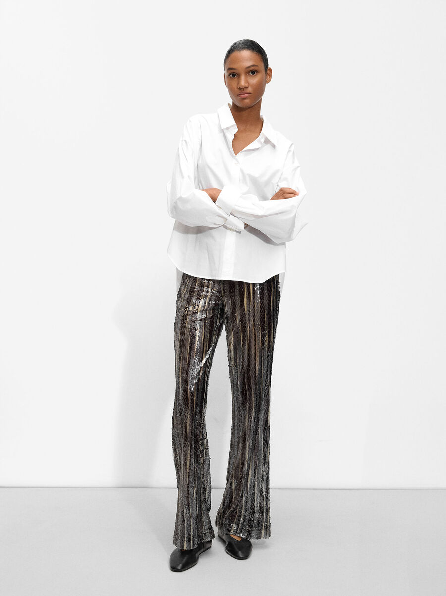 Flared trousers with sequins