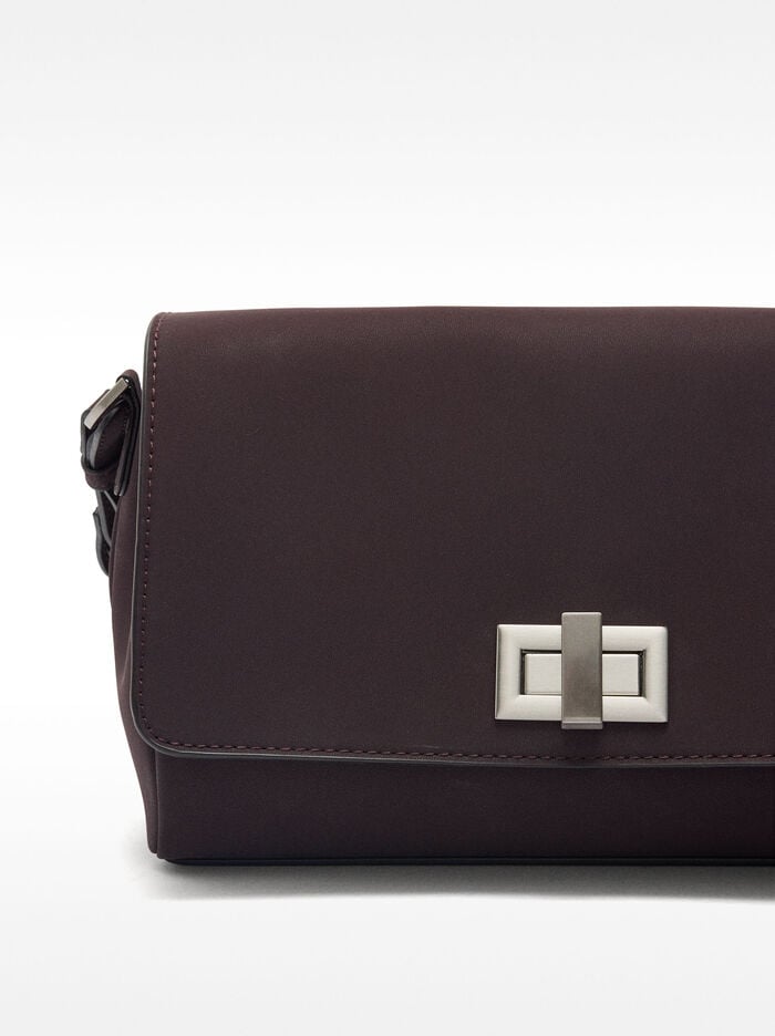 Crossbody bag with soft texture and flap