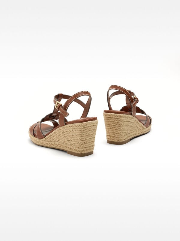 Wedge sandals with crossed straps