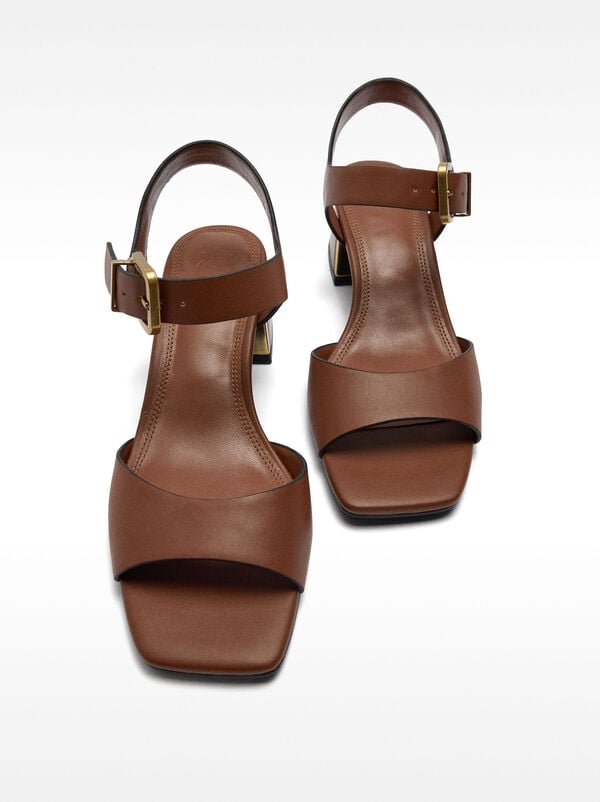 Heeled sandal with strap