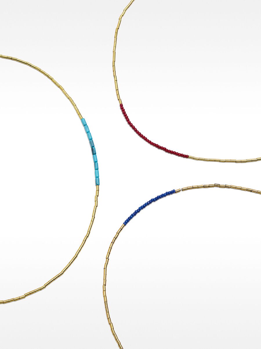 Set of short necklaces with stones