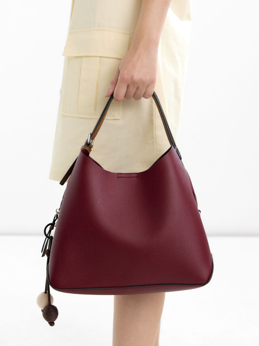 Handbag with strap