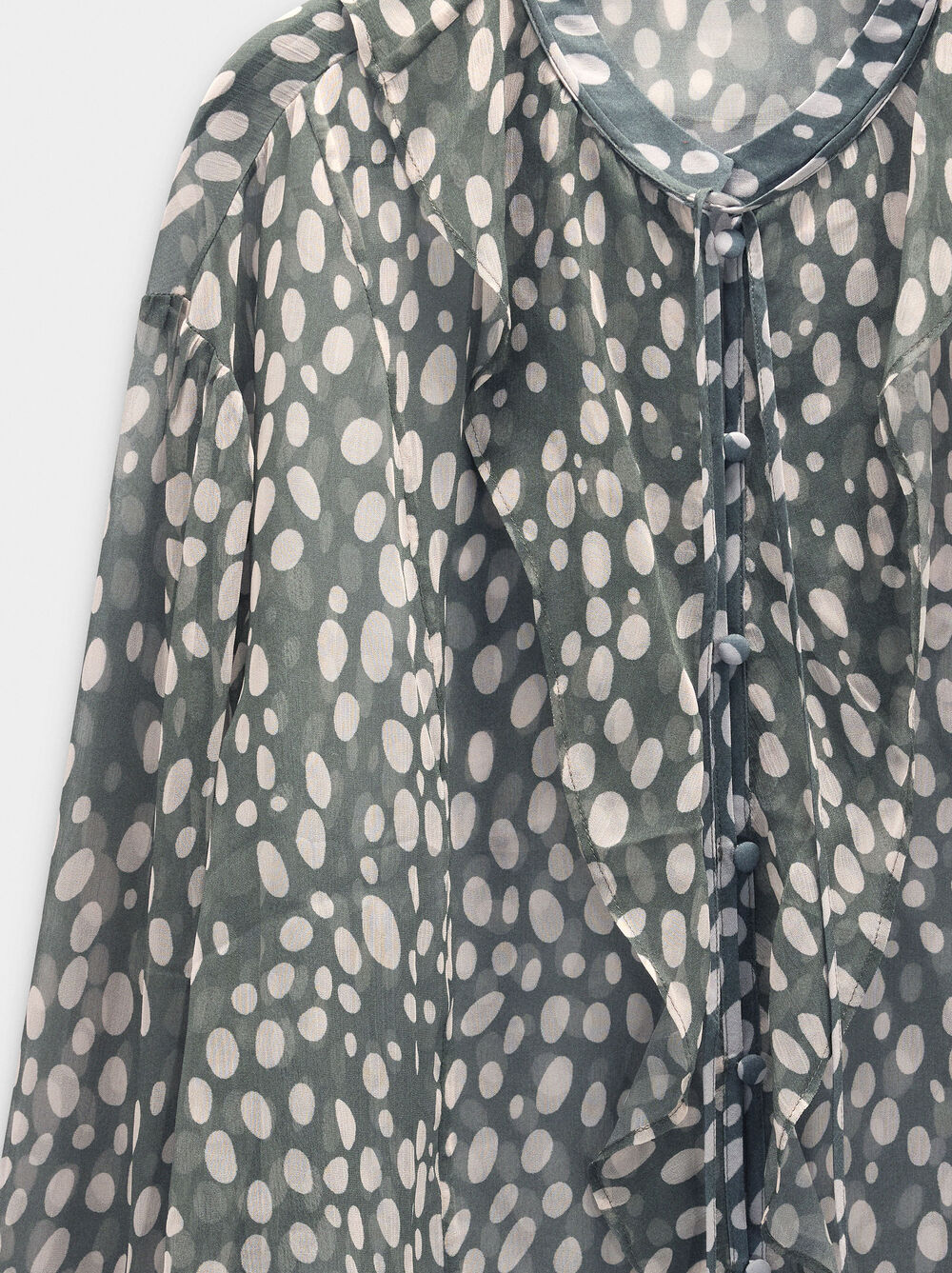 Blusa semitrasparente stampata