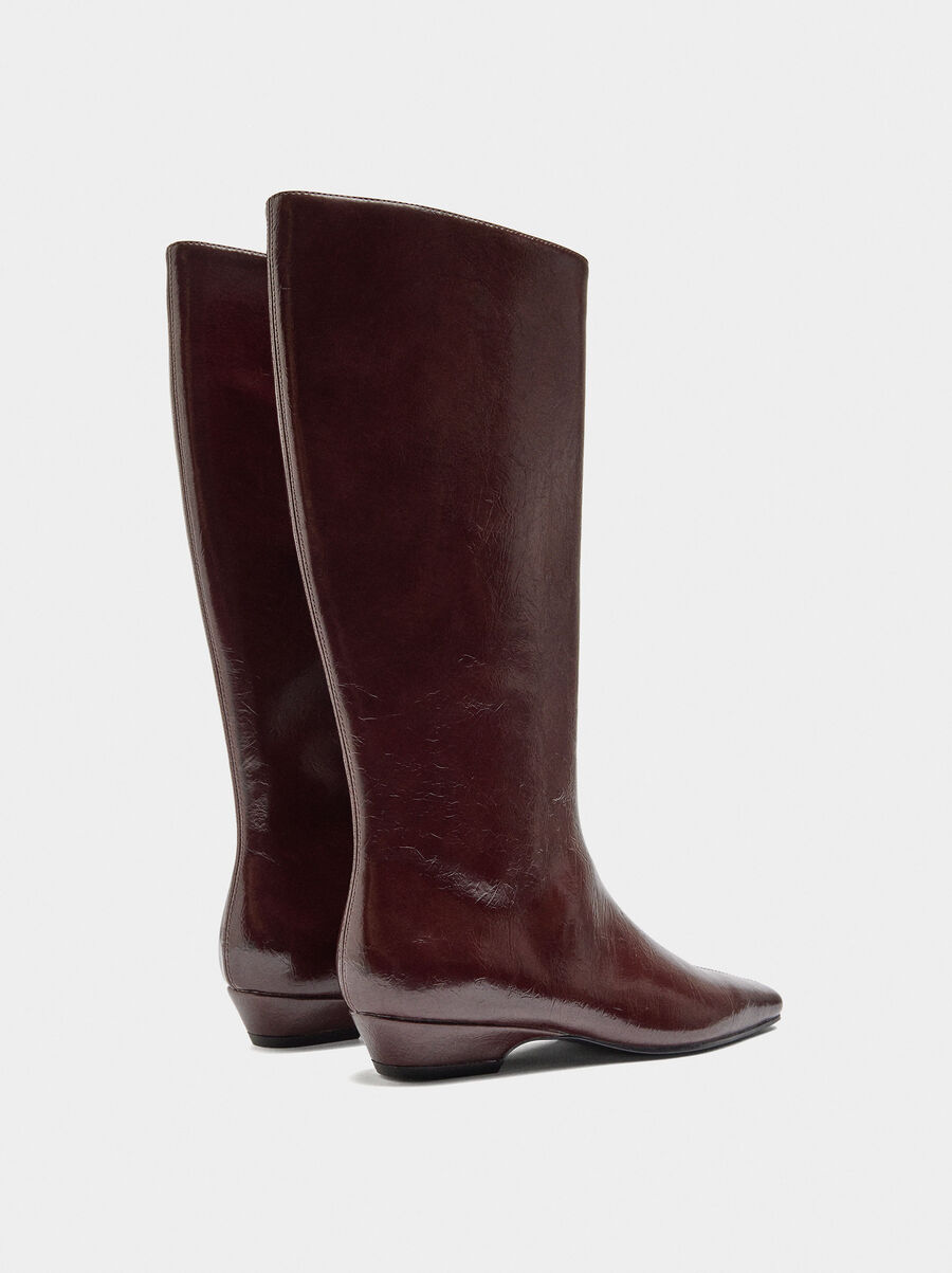 Patent high shaft boots