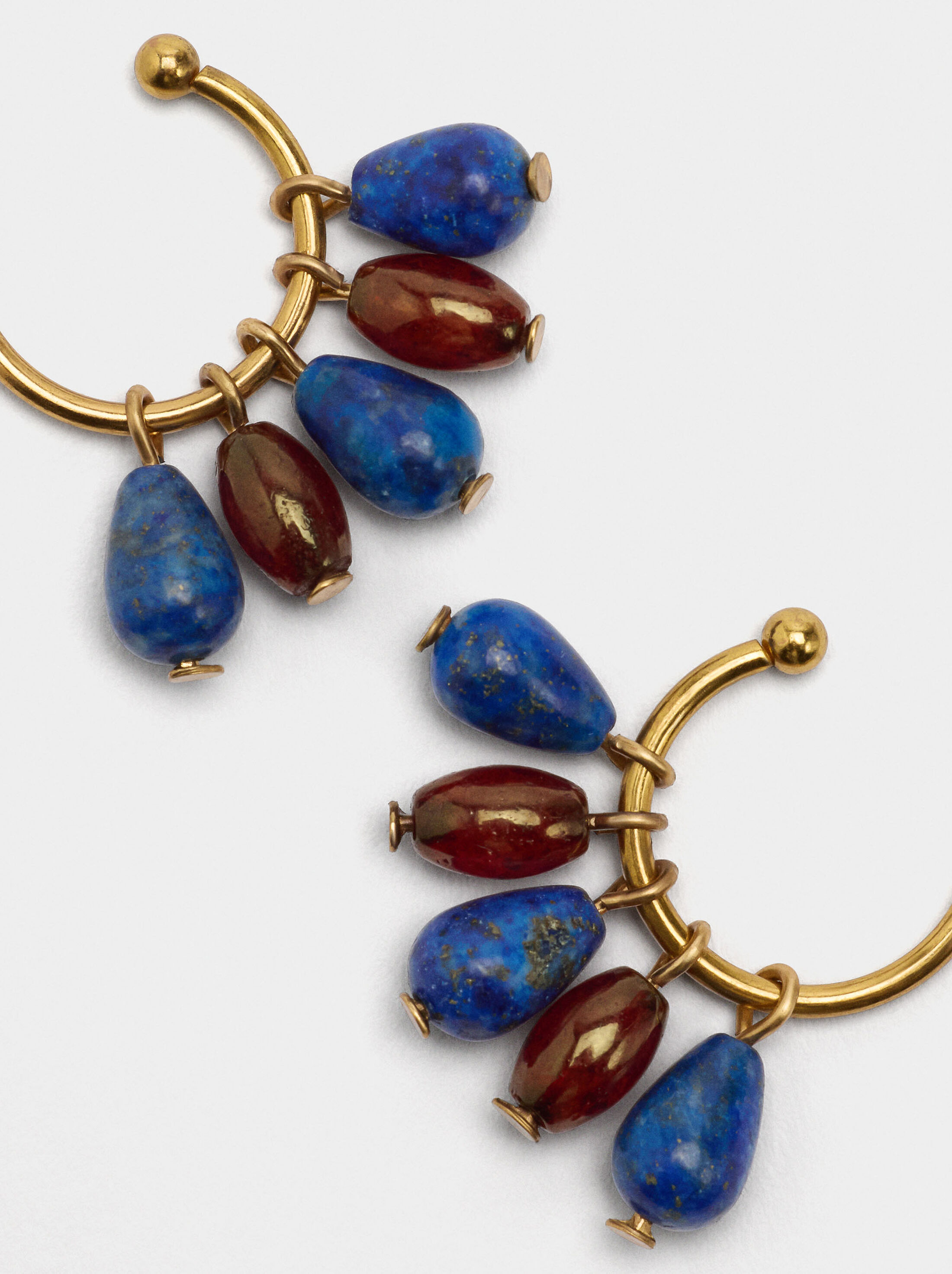 Arracades de cèrcol obertes amb pedres image number 2.0