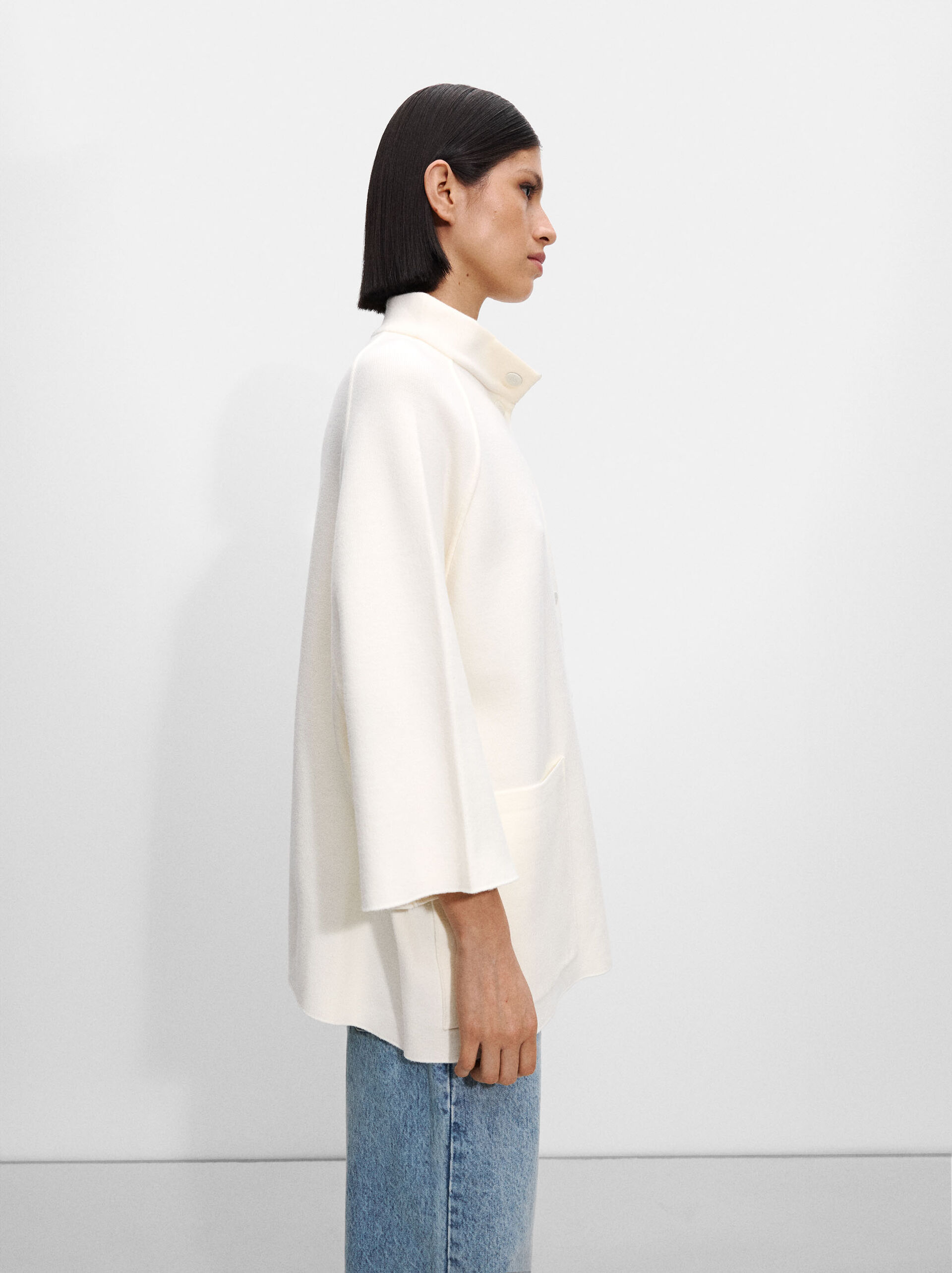 Knitted poncho with buttons image number 2.0