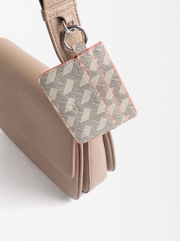 Crossbag with flap closure