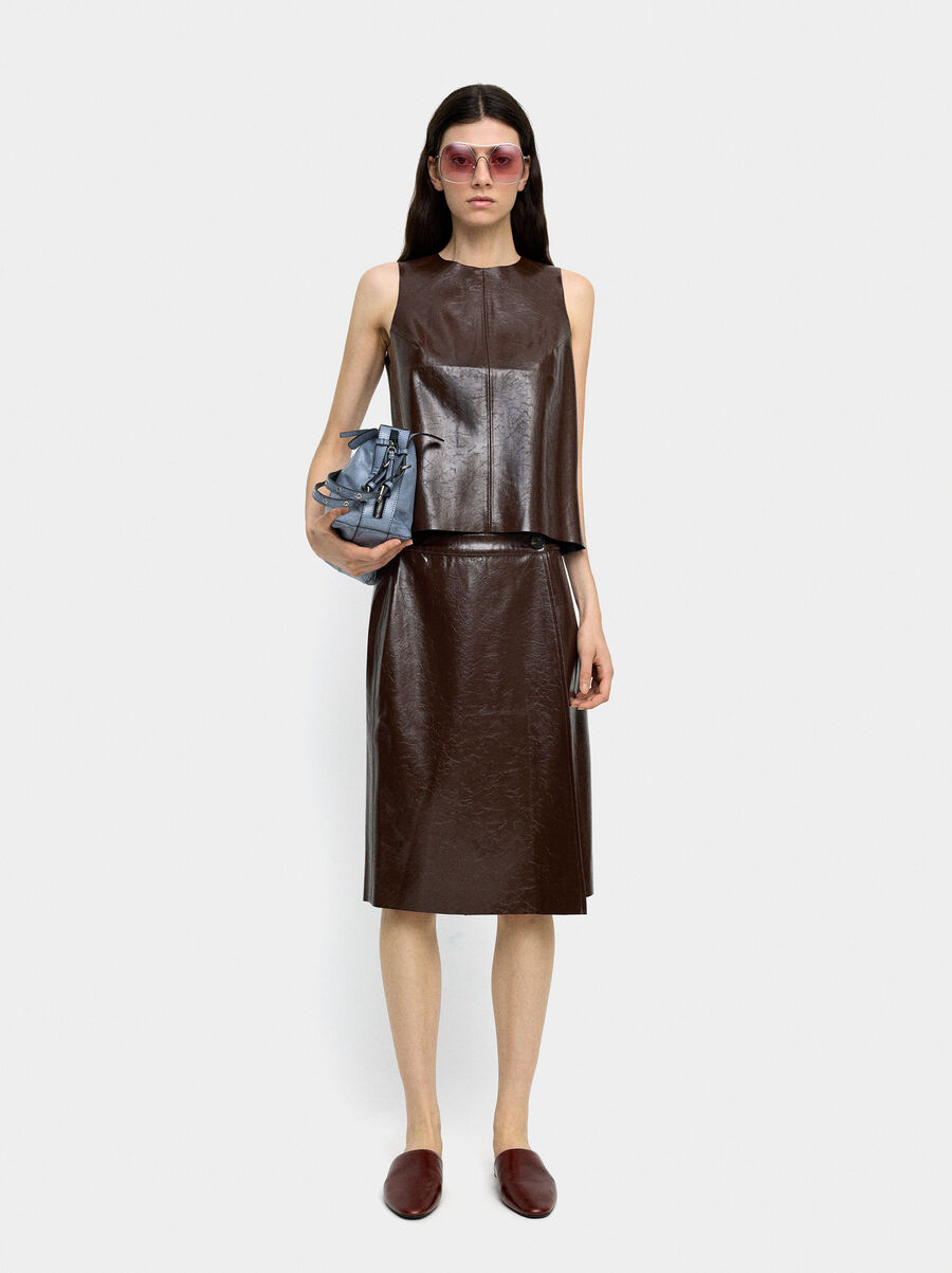 Top with leather effect