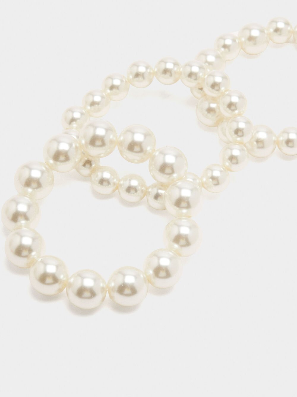 Set of elastic bracelets with pearls