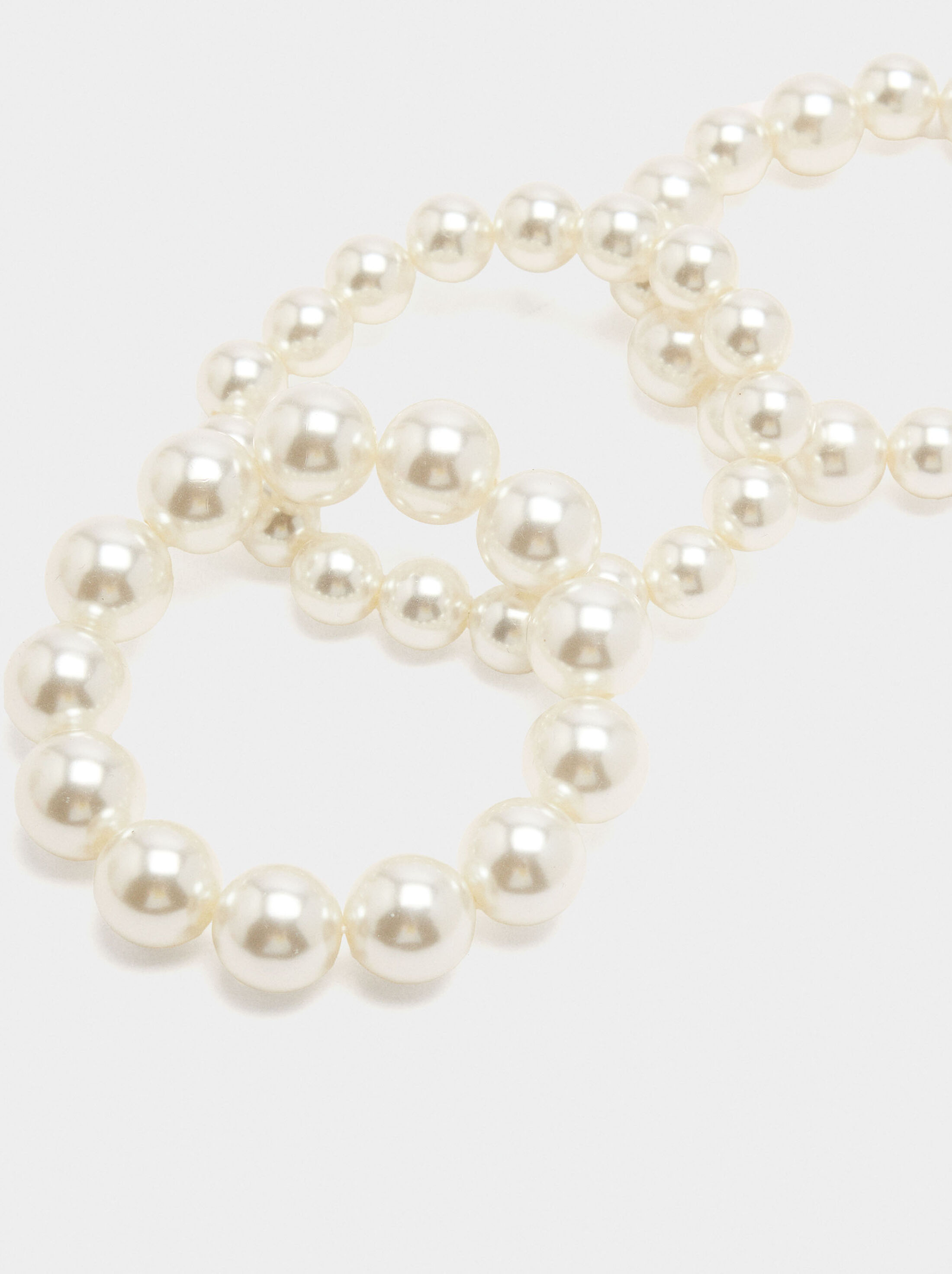 Set of elastic bracelets with pearls image number 1.0