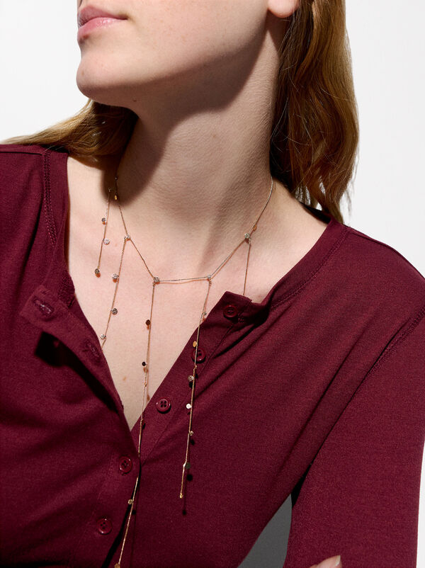 Long necklace with hammered effect