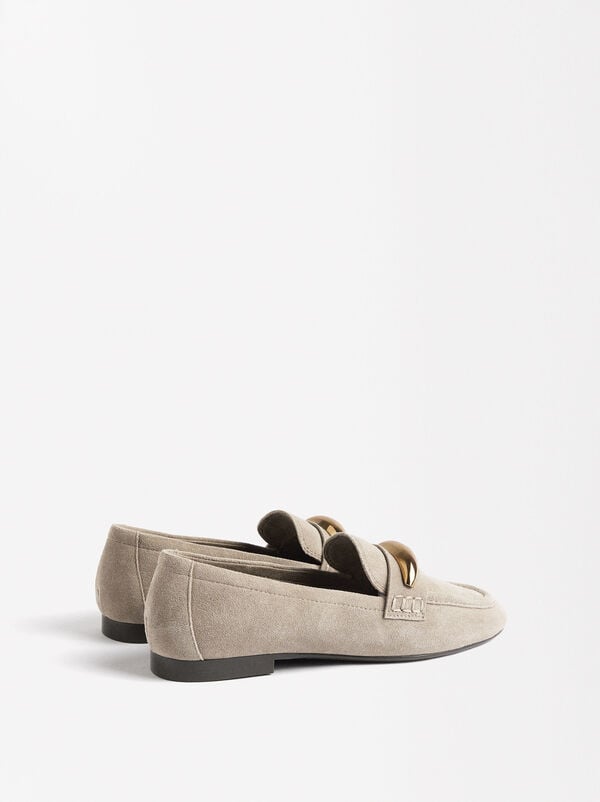Leather moccasins with metallic detail