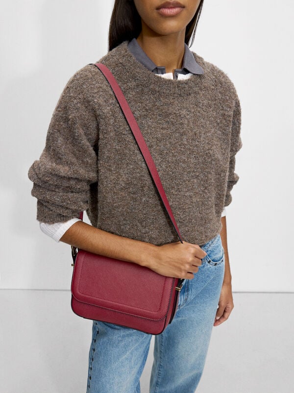 Crossbag with flap closure
