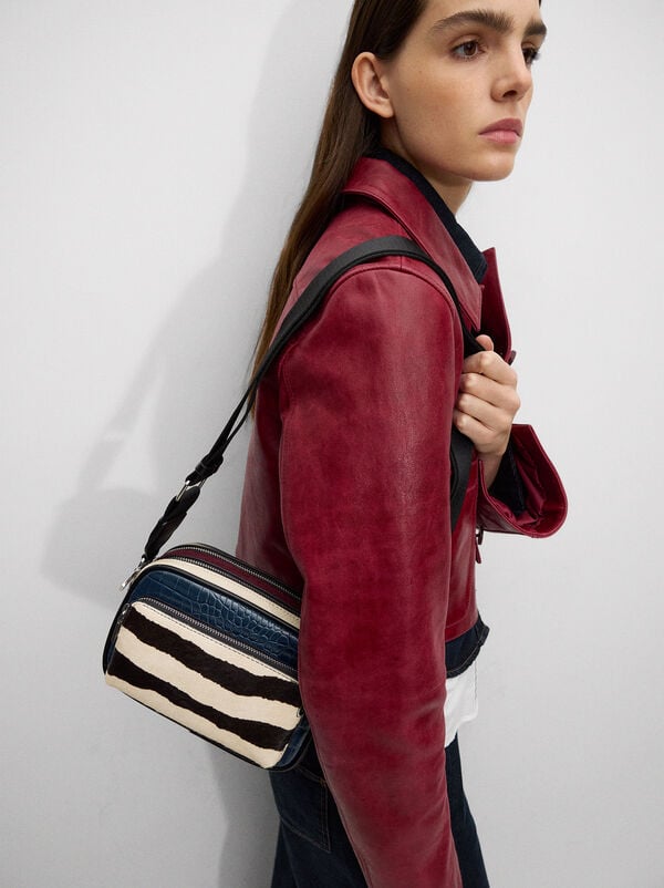 Crossbody bag with leather
