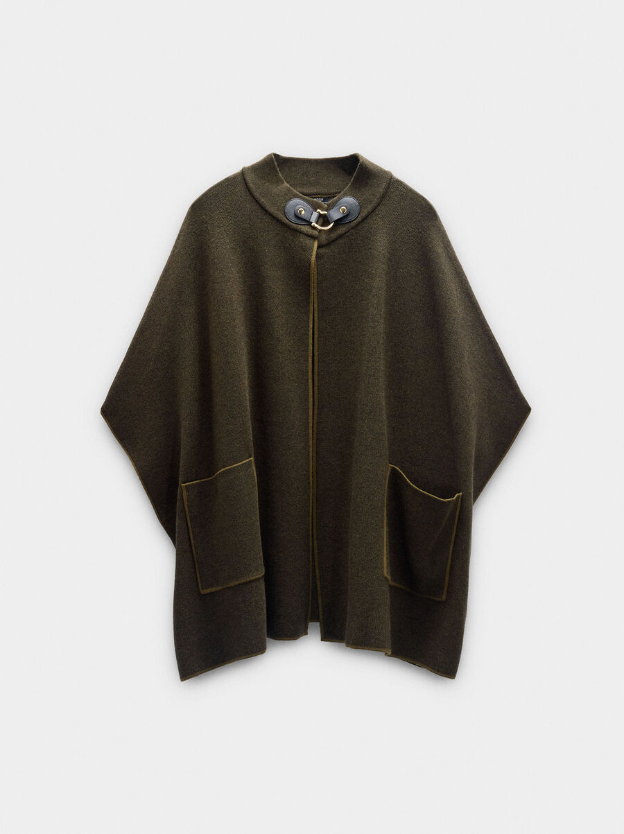 Knitted poncho with stitching detail