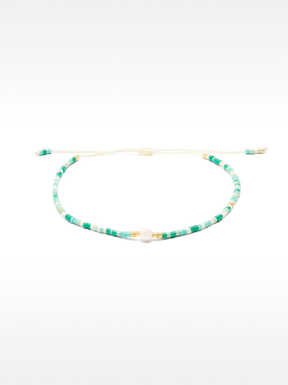 Adjustable bracelet with pearls and beads