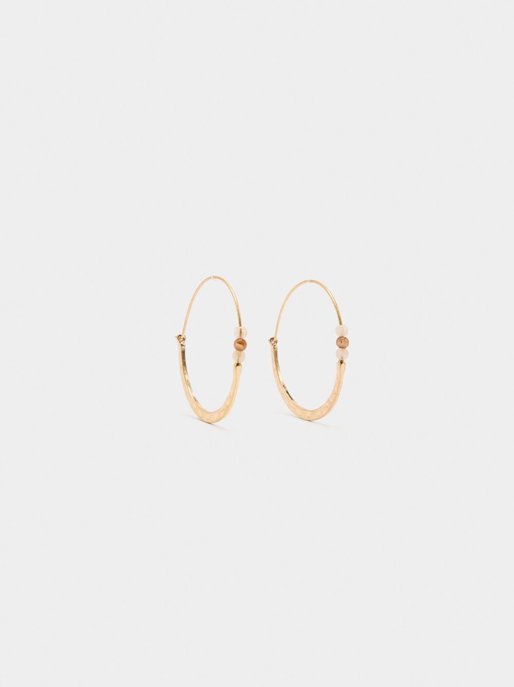 Flat hoop earrings with beads