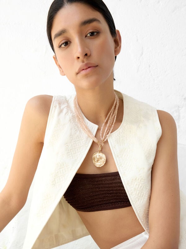 Multi-strand necklace with medal