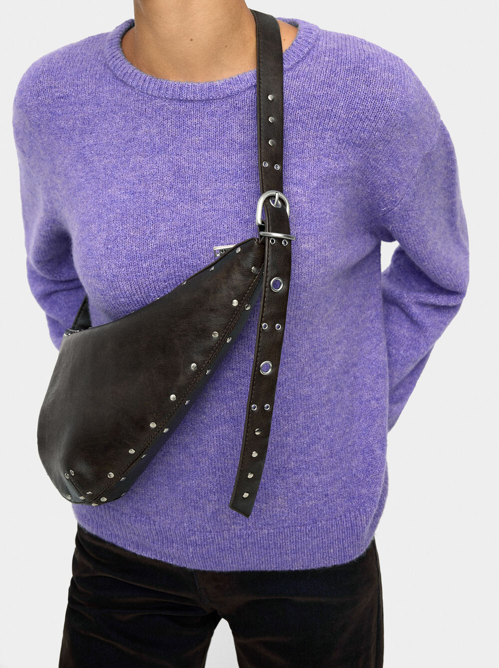 Asymmetric shoulder bag with studs