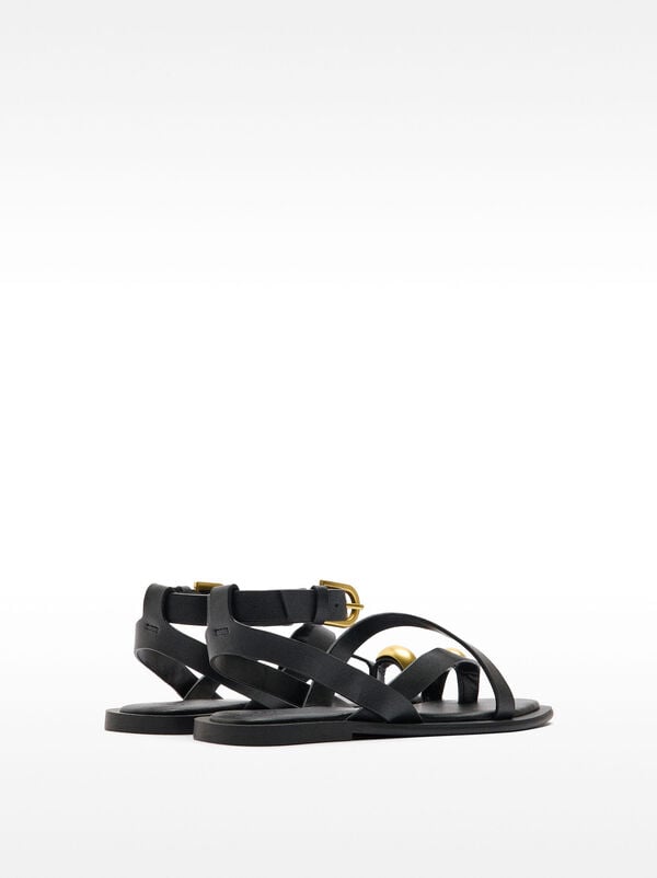 Leather sandals with metallic detail straps