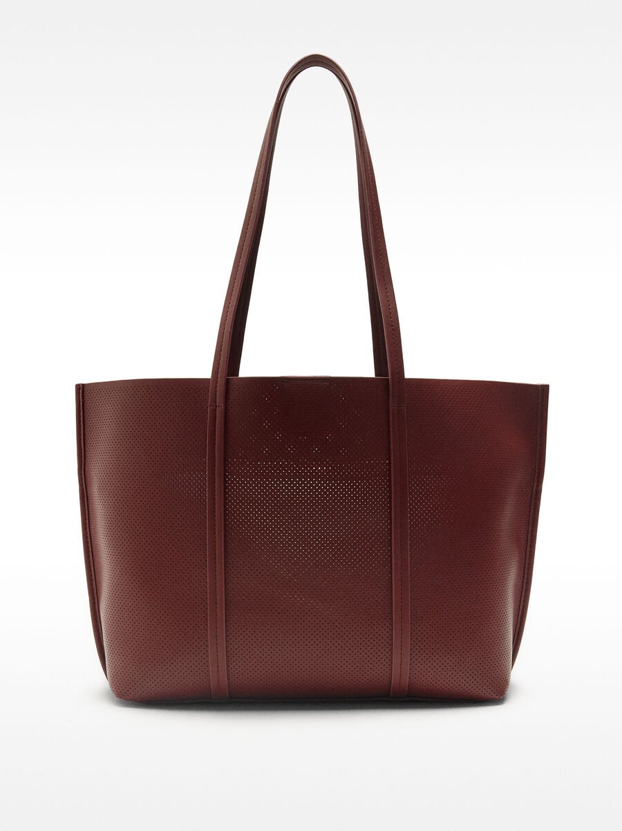 Perforated shopper bag with removable pouch