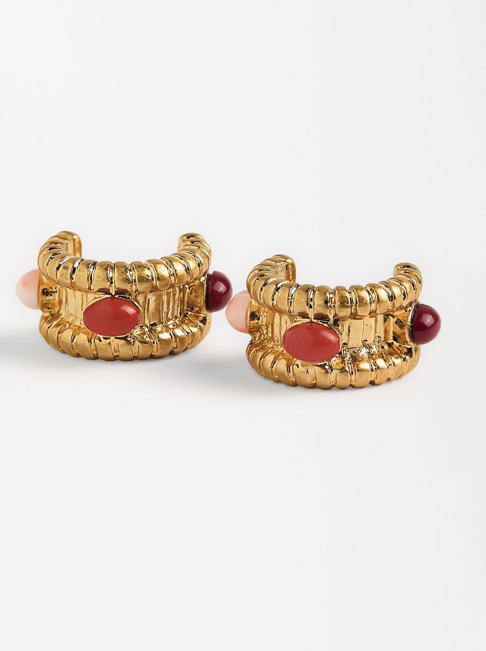 Open hoops with stones