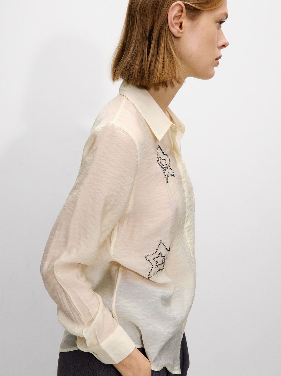 Shirt with bead detailing