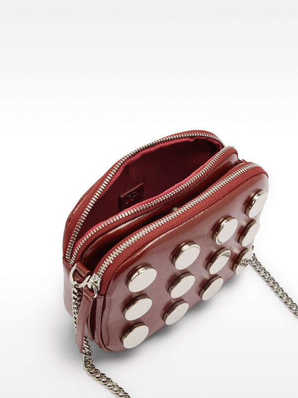 Crossbody bag metallic details