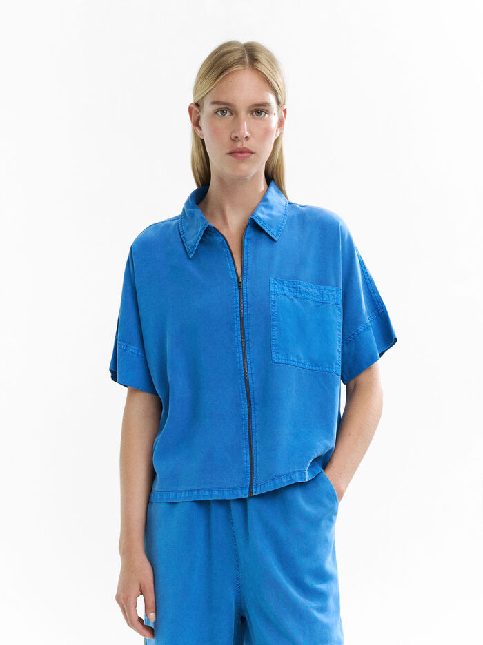 Camisa con cremallera y bolsillo