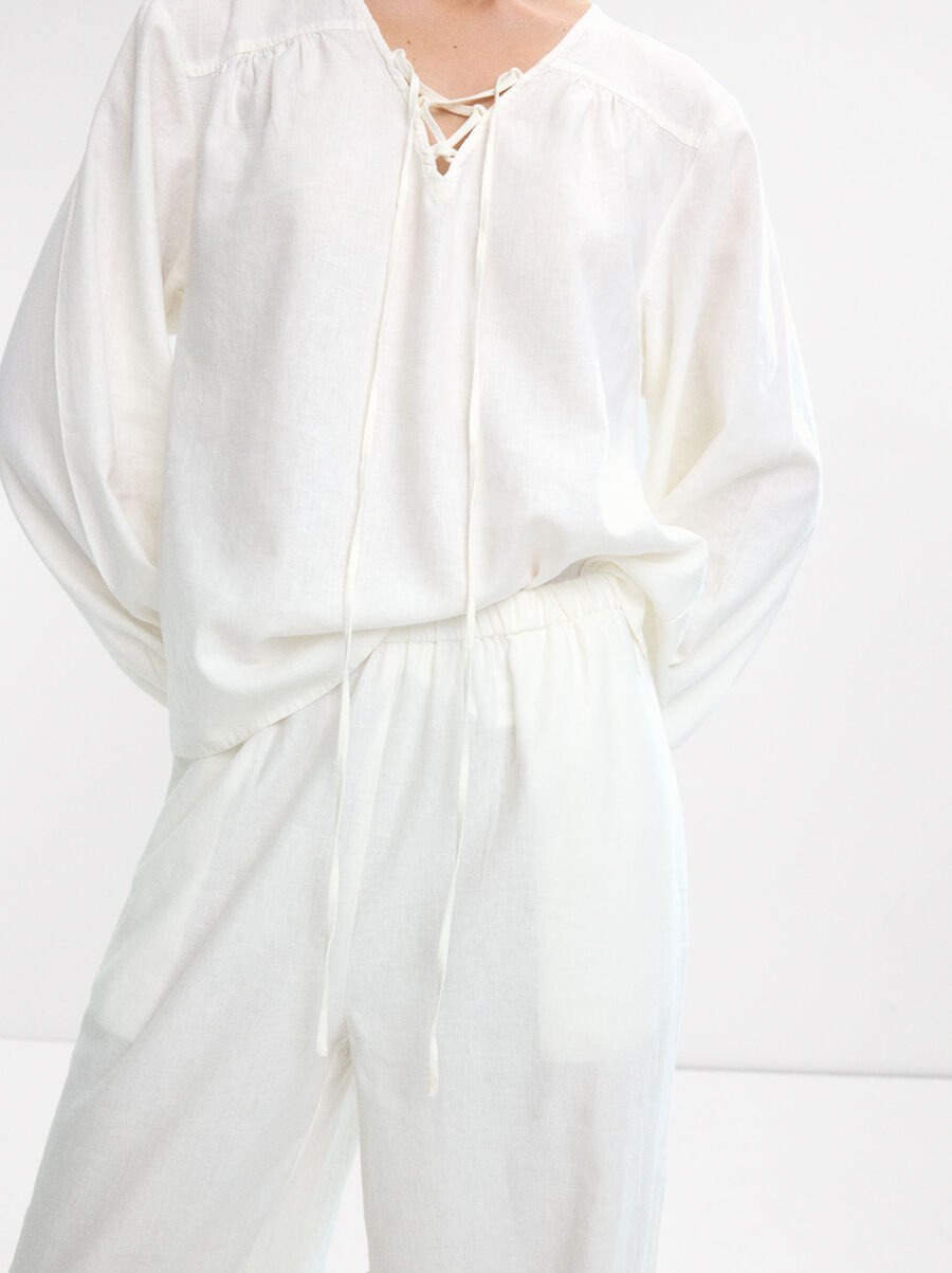 Trousers with linen elastic waistband