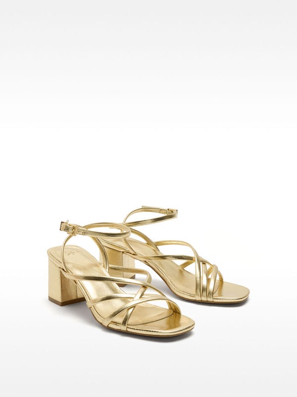 Sandali con tacco incrociati metallizzati