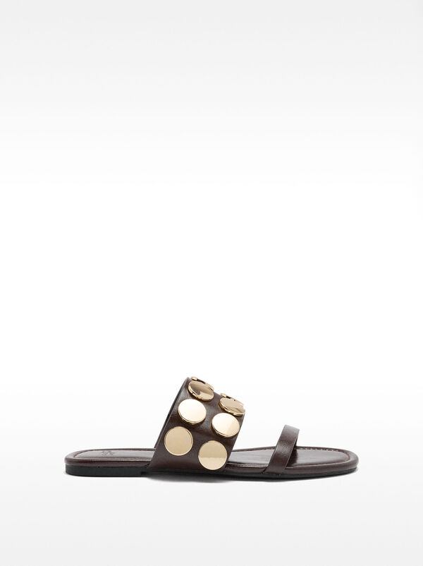Flat sandals with metallic details