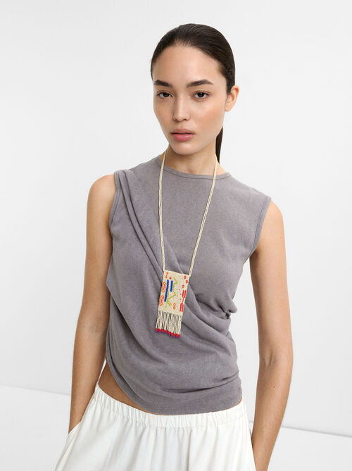 Long bead necklace with pocket