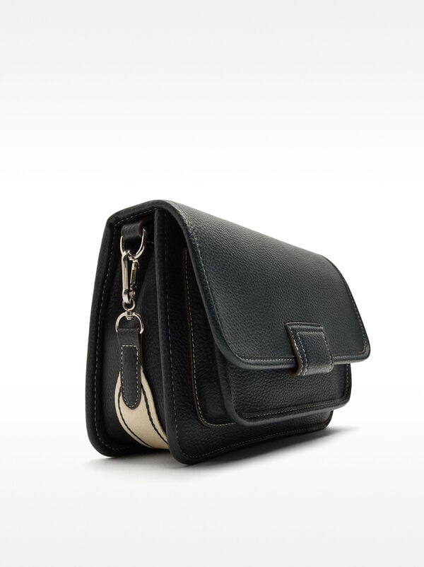 Crossbody bag with texture and flap closure