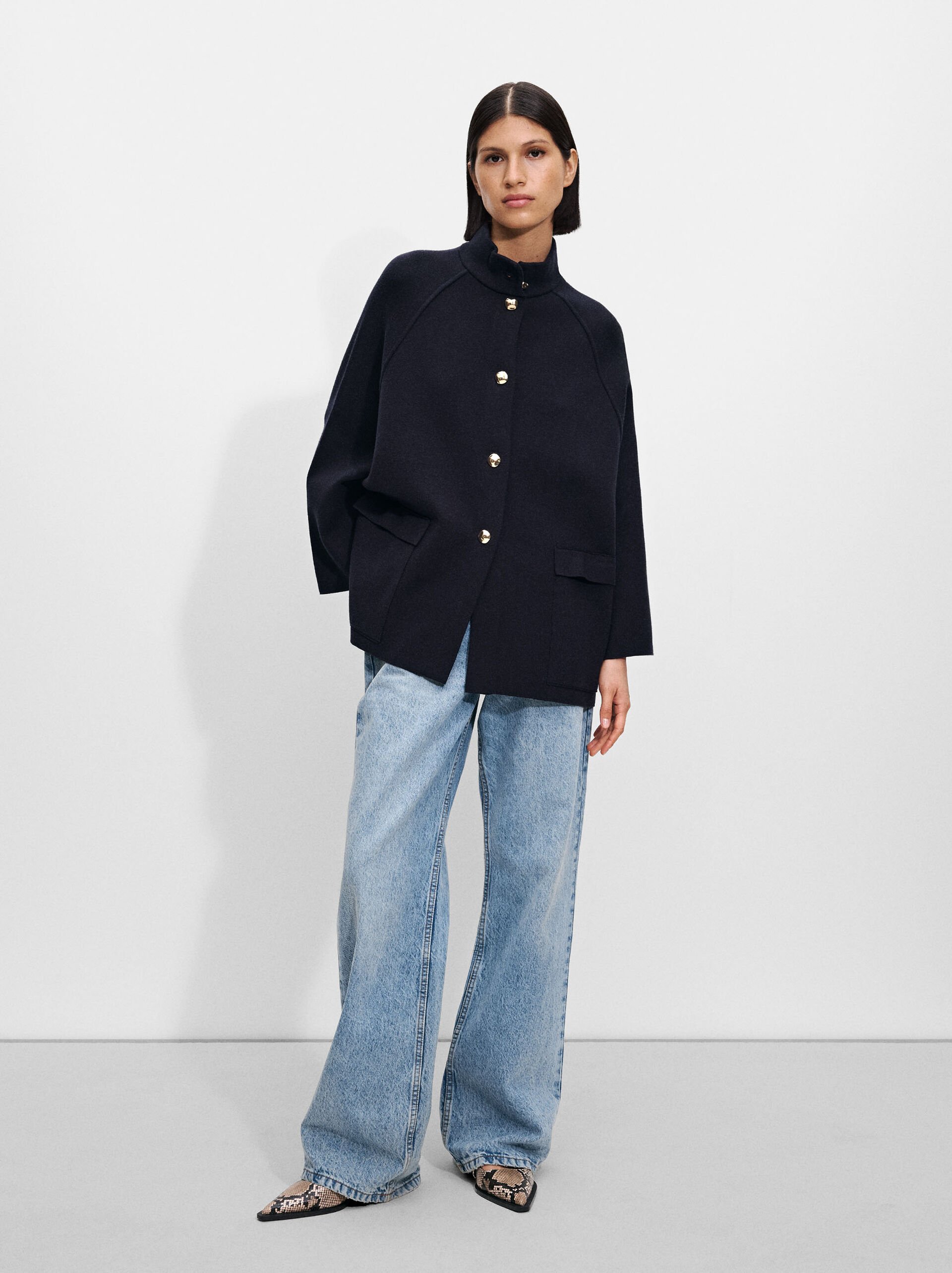 Knit poncho with high neck image number 0.0