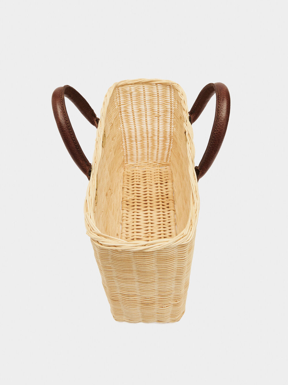 Rattan basket with leather details