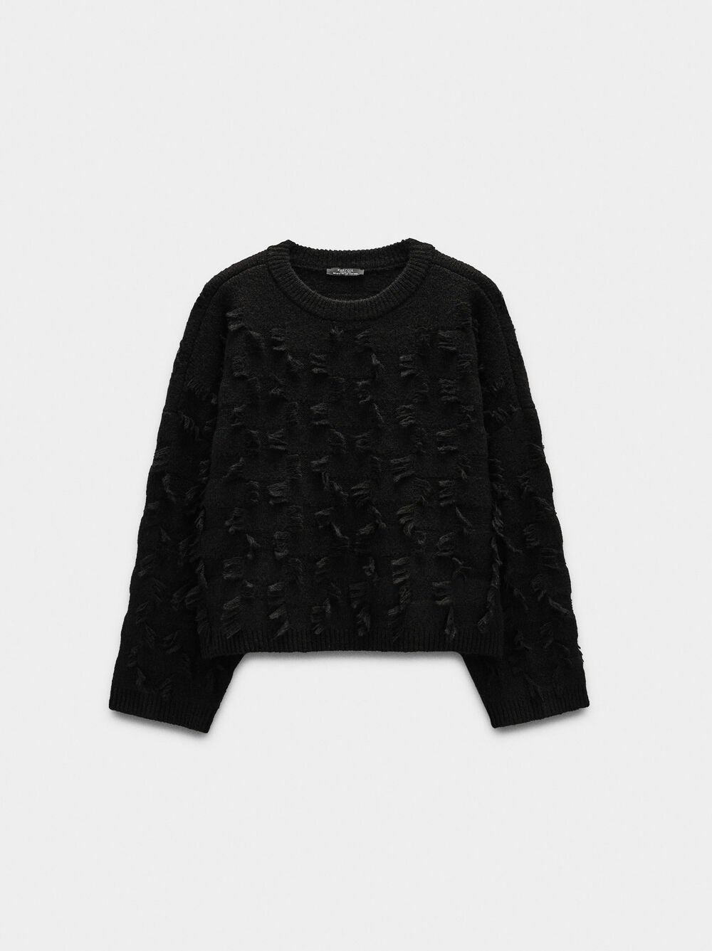 Knitted jumper with fringes